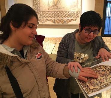 Student of the Lebanese School for the Blind and Deaf at the National Museum of Beirut Student of the Lebanese School for the Blind and Deaf at the National Museum of Beirut